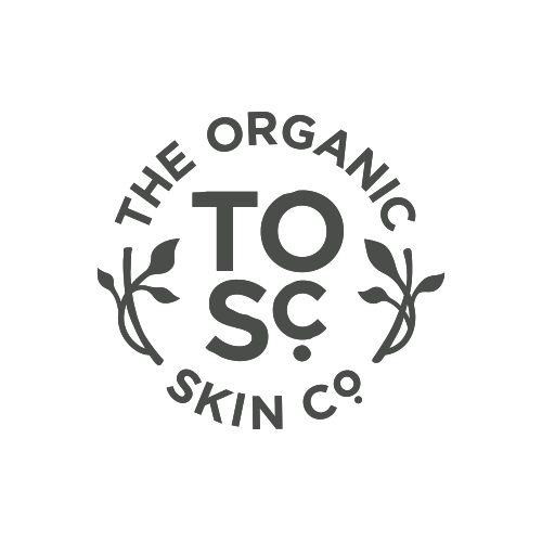 The Organic Skin Co. logo in gray, featuring stylized text and leaf illustrations.